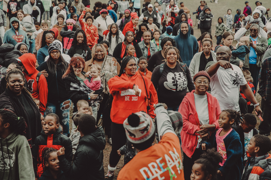 Champion Life outreach crowd in the community
