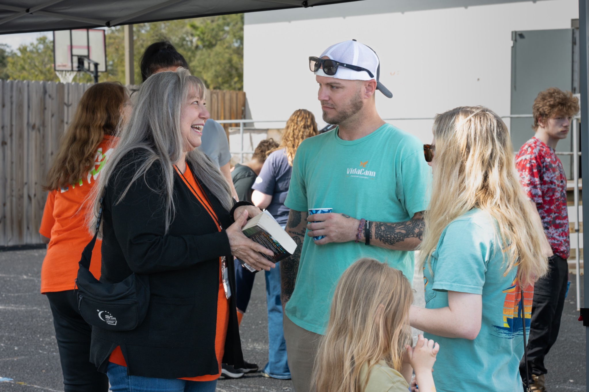 One-on-one outreach conversation at Champion Life Church